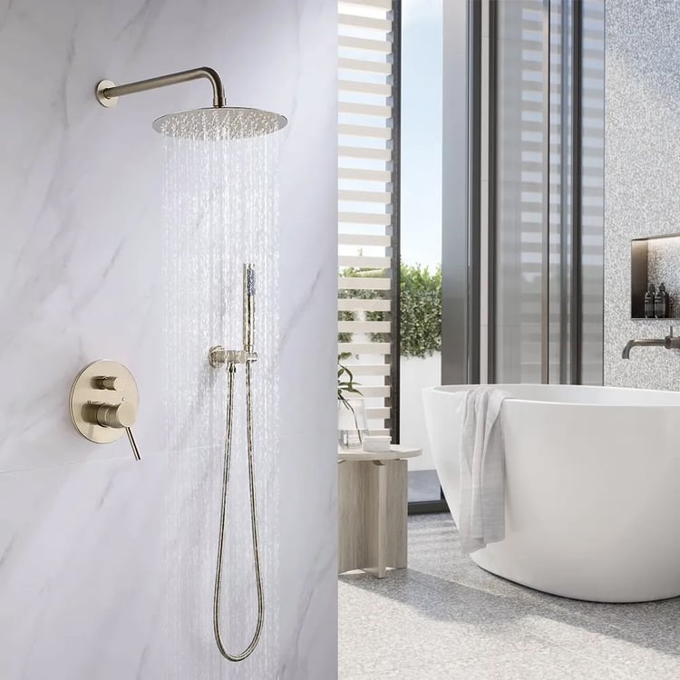 Brushed gold shower in a bright bathroom